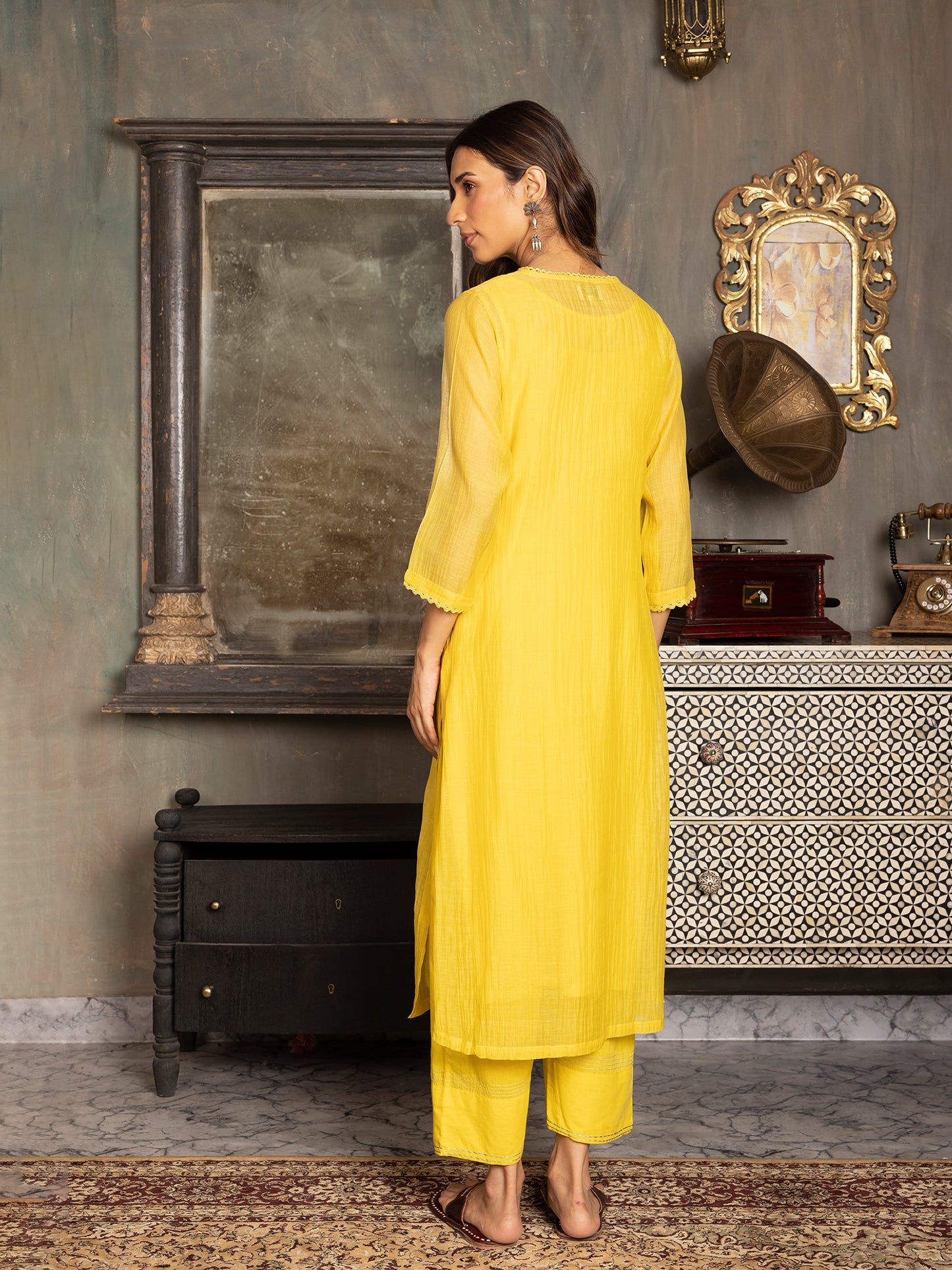 Lemon yellow mul chanderi thread and fabric cutwork work kurta set