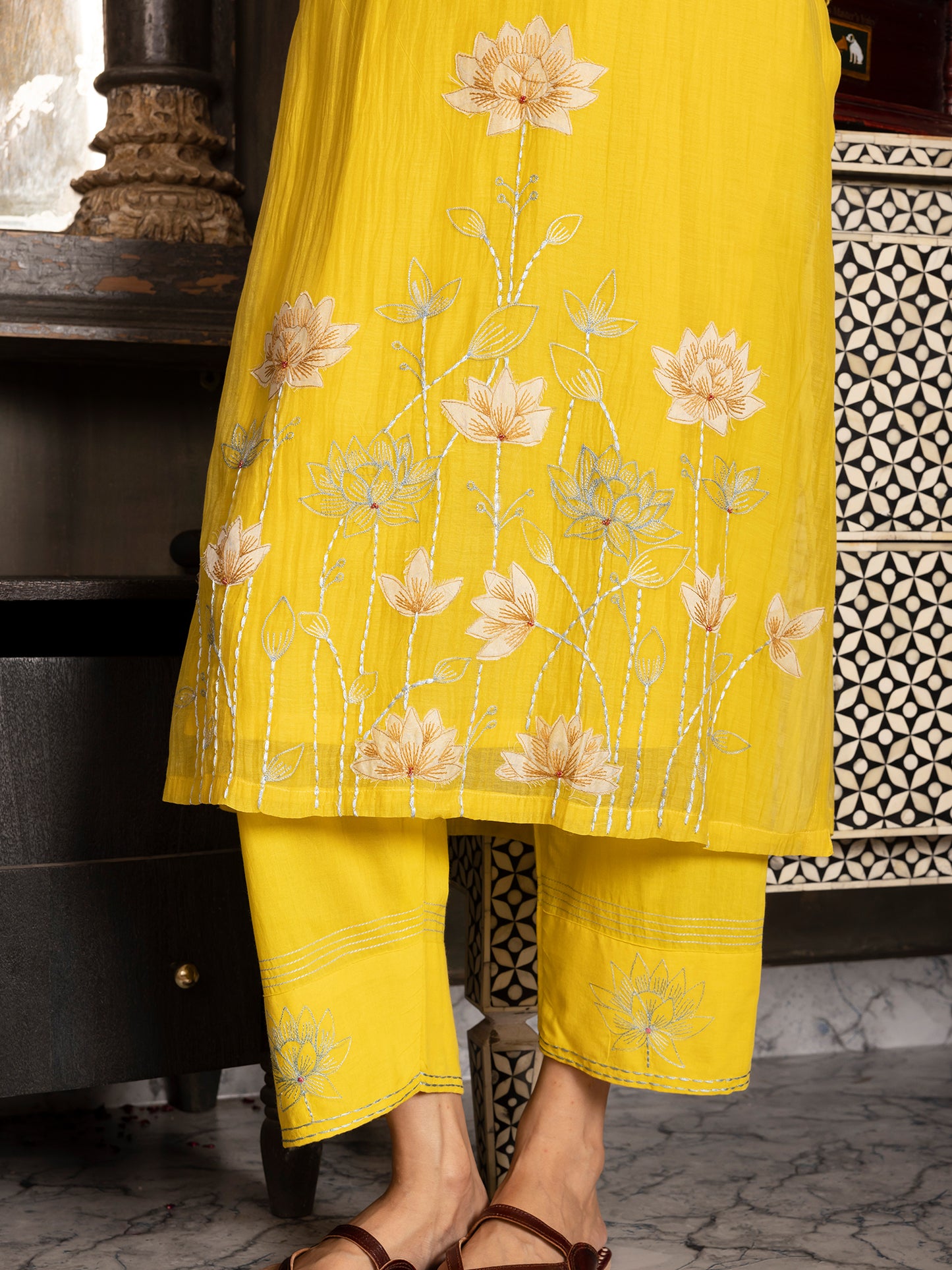 Lemon yellow mul chanderi thread and fabric cutwork work kurta set