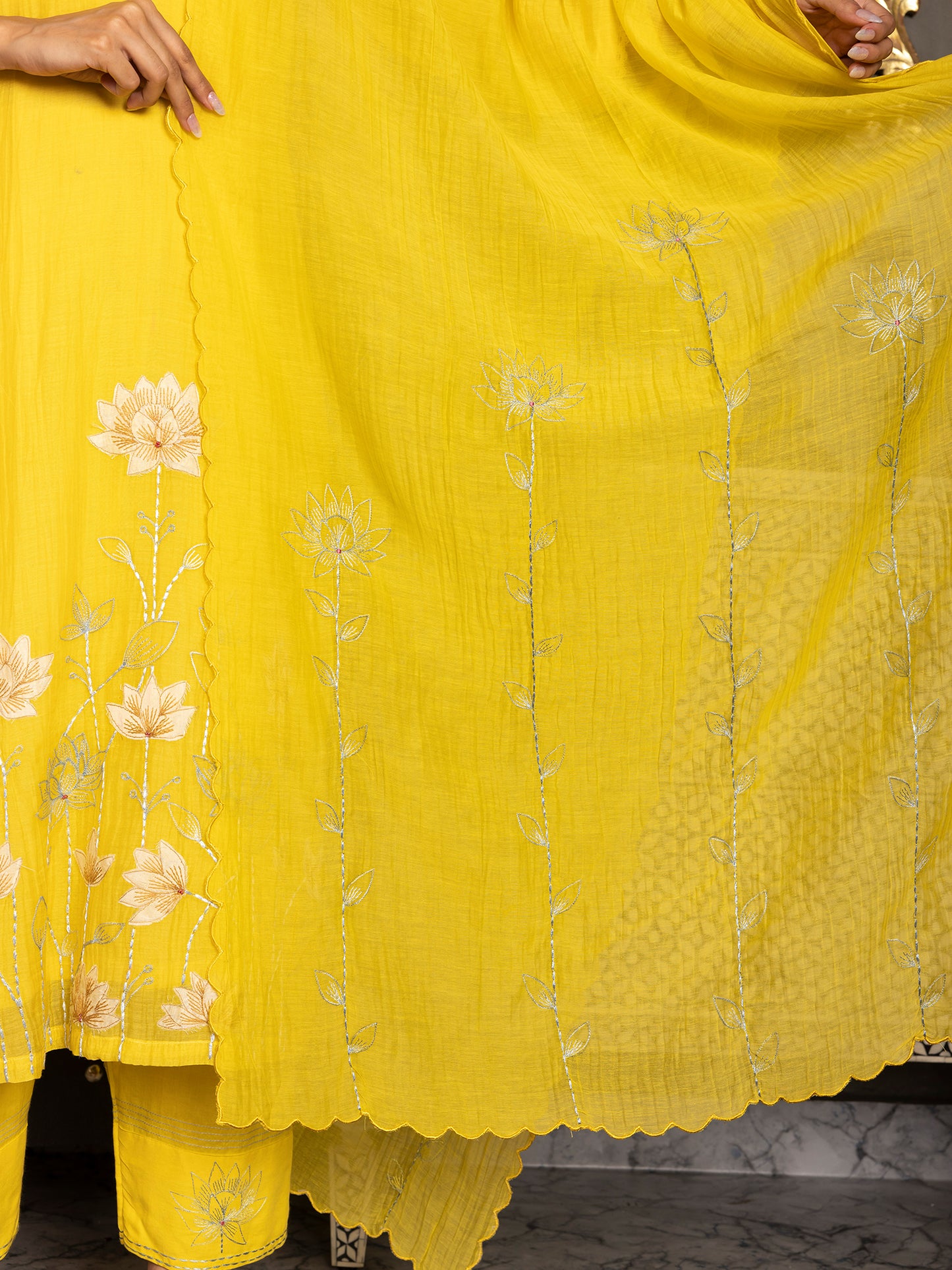 Lemon yellow mul chanderi thread and fabric cutwork work kurta set