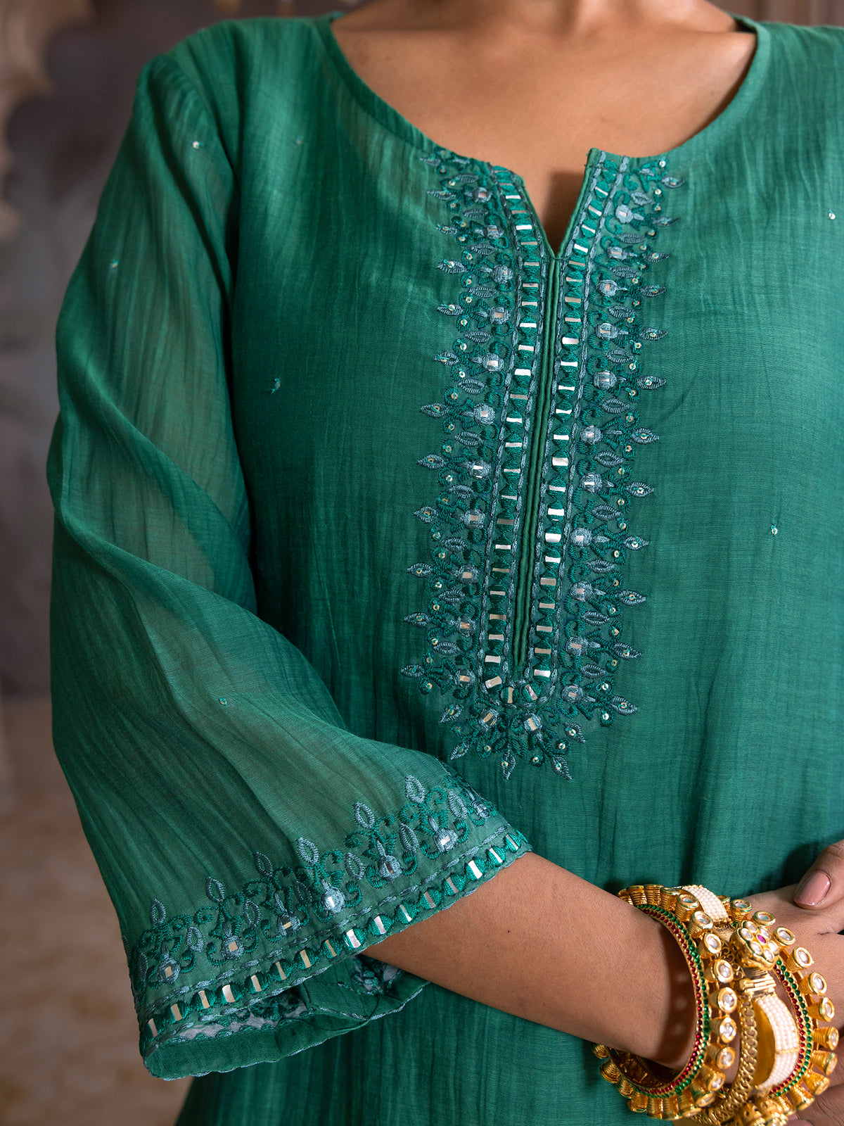 Bottle green mul chanderi thread with mirror and sequence embroidery kurta
